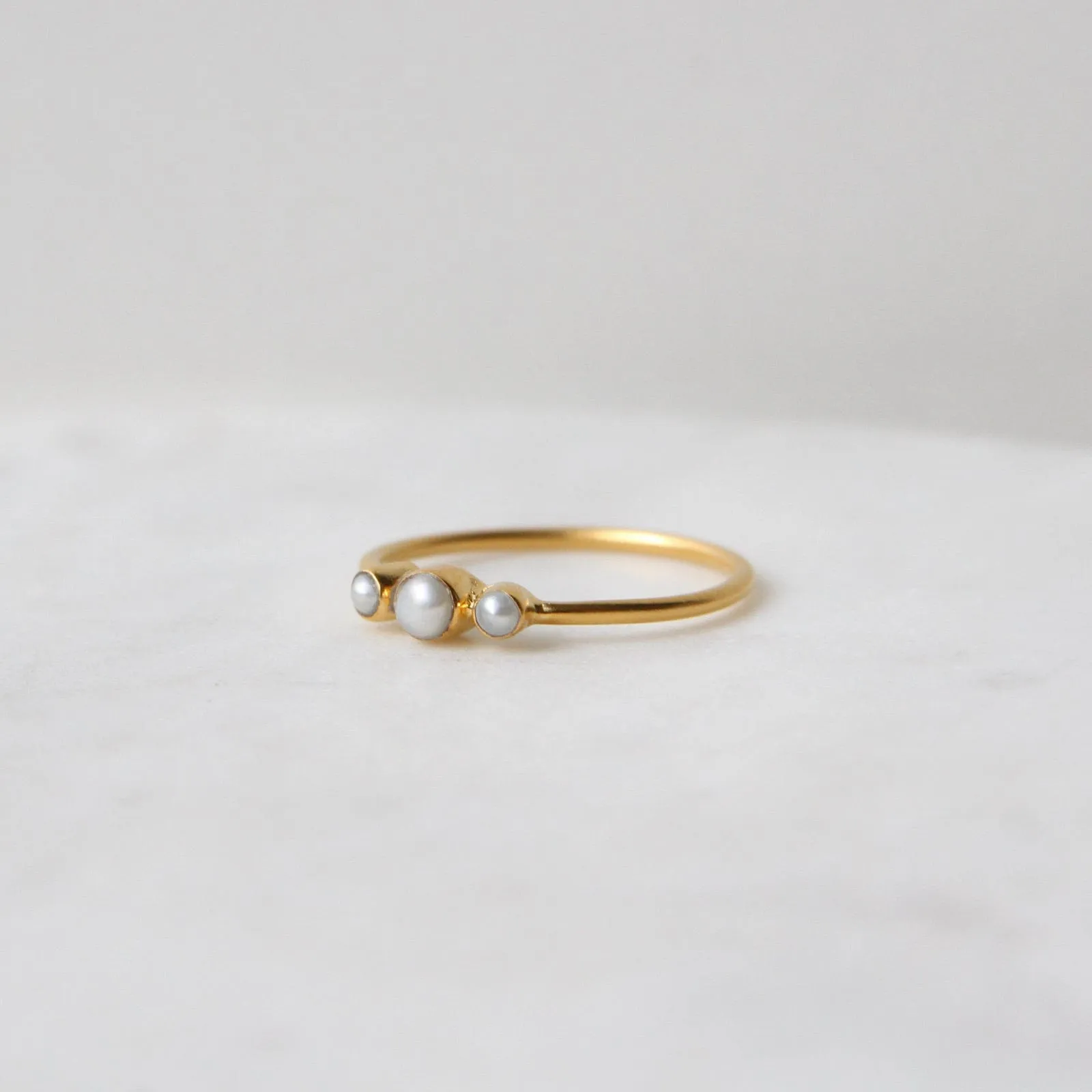 Tiny Graduated Three White Pearl in Gold Plated Brass Ring