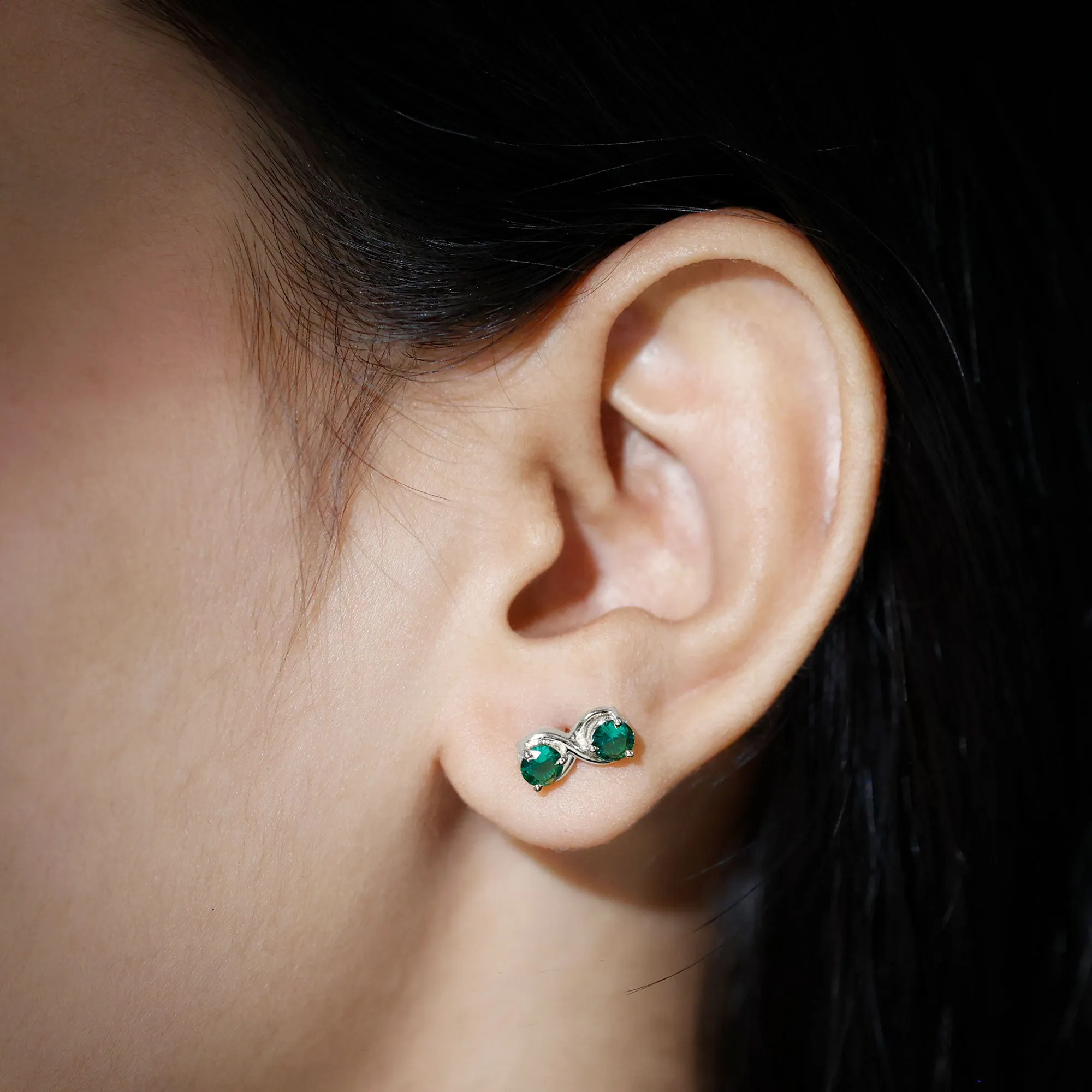 Two Stone Lab Grown Emerald Infinity Stud Earrings