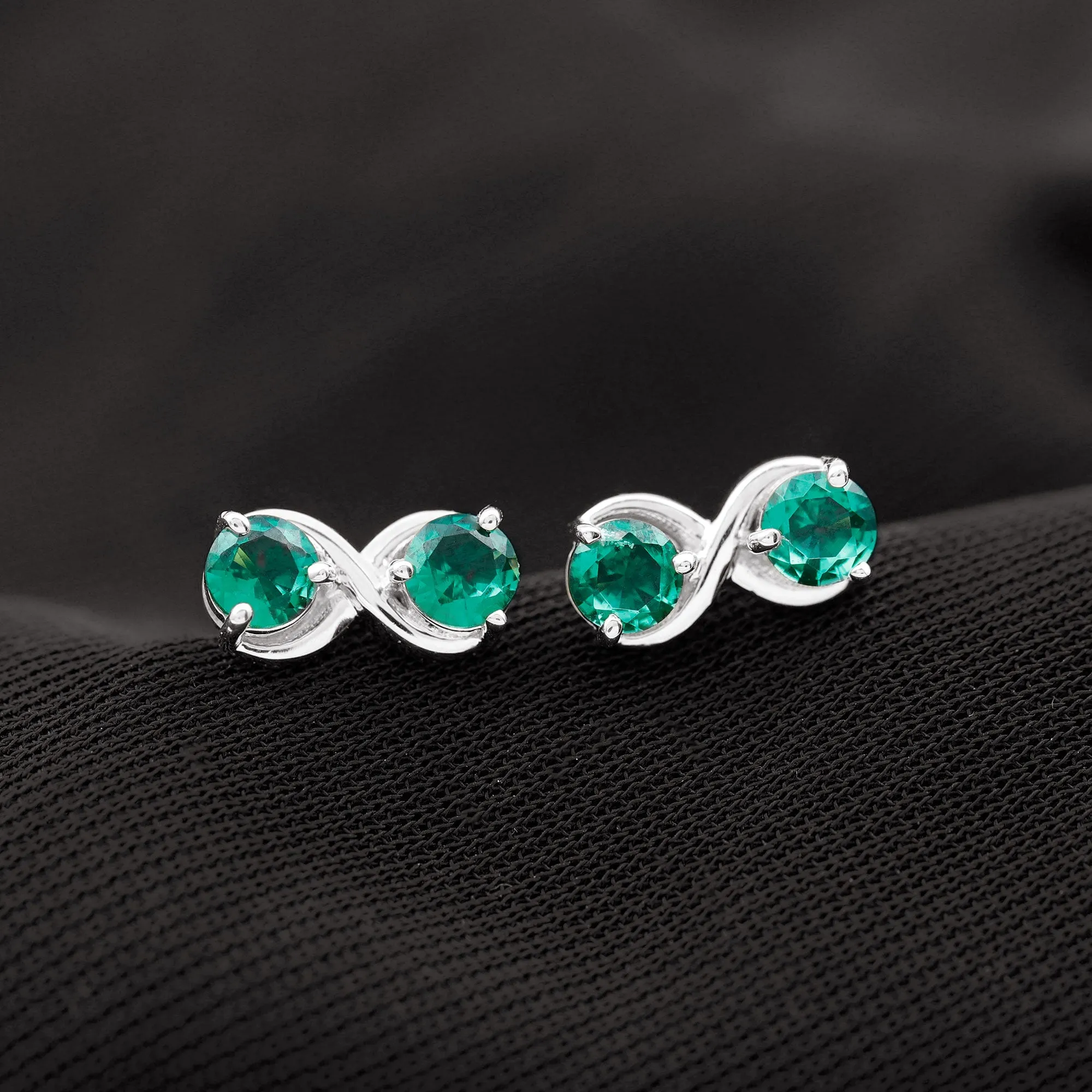 Two Stone Lab Grown Emerald Infinity Stud Earrings