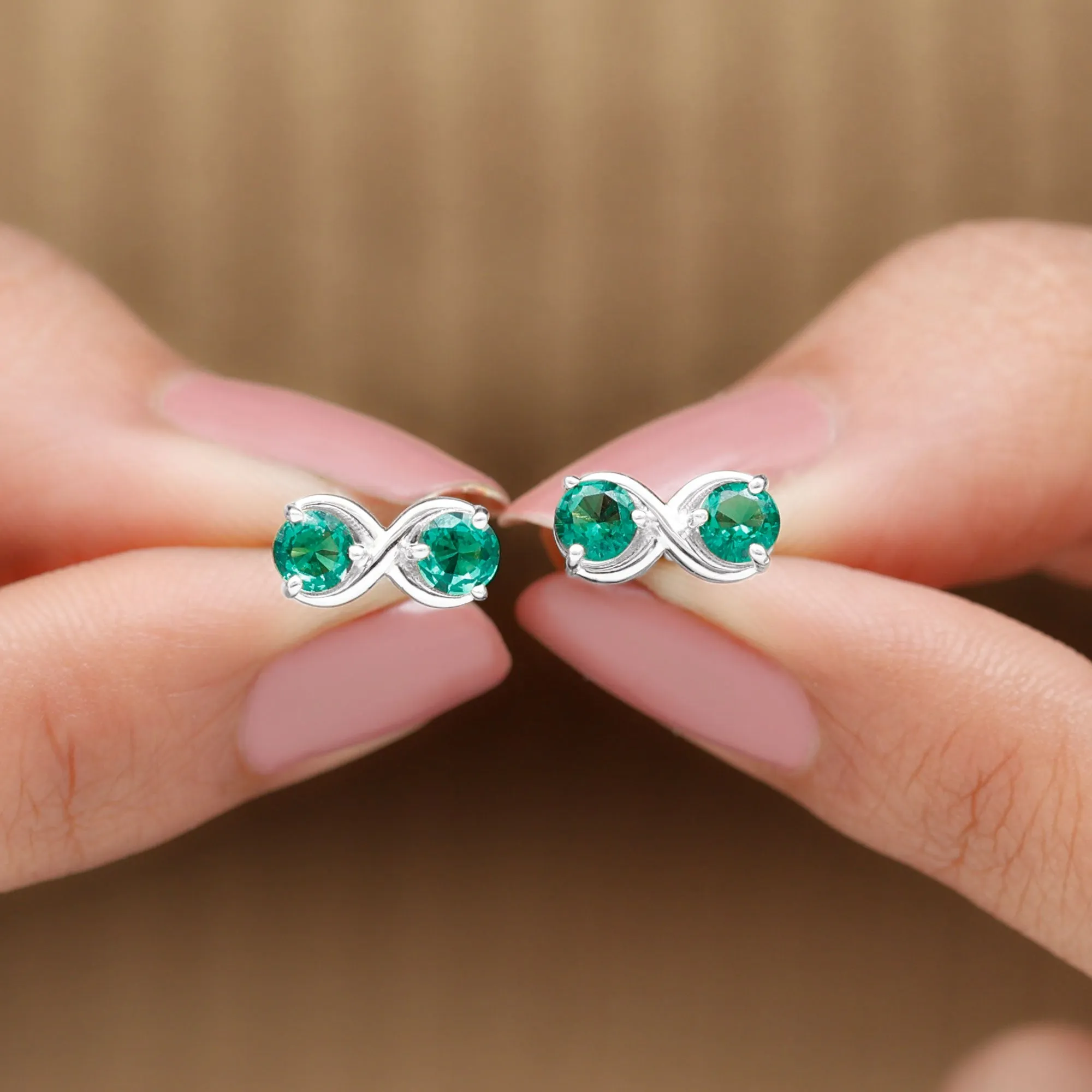 Two Stone Lab Grown Emerald Infinity Stud Earrings