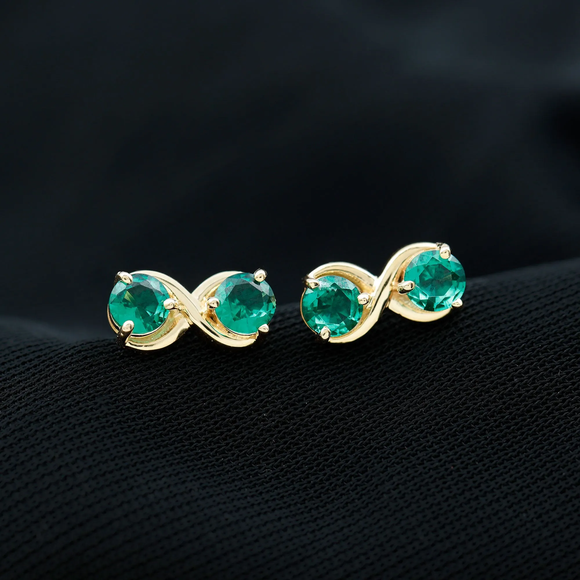 Two Stone Lab Grown Emerald Infinity Stud Earrings