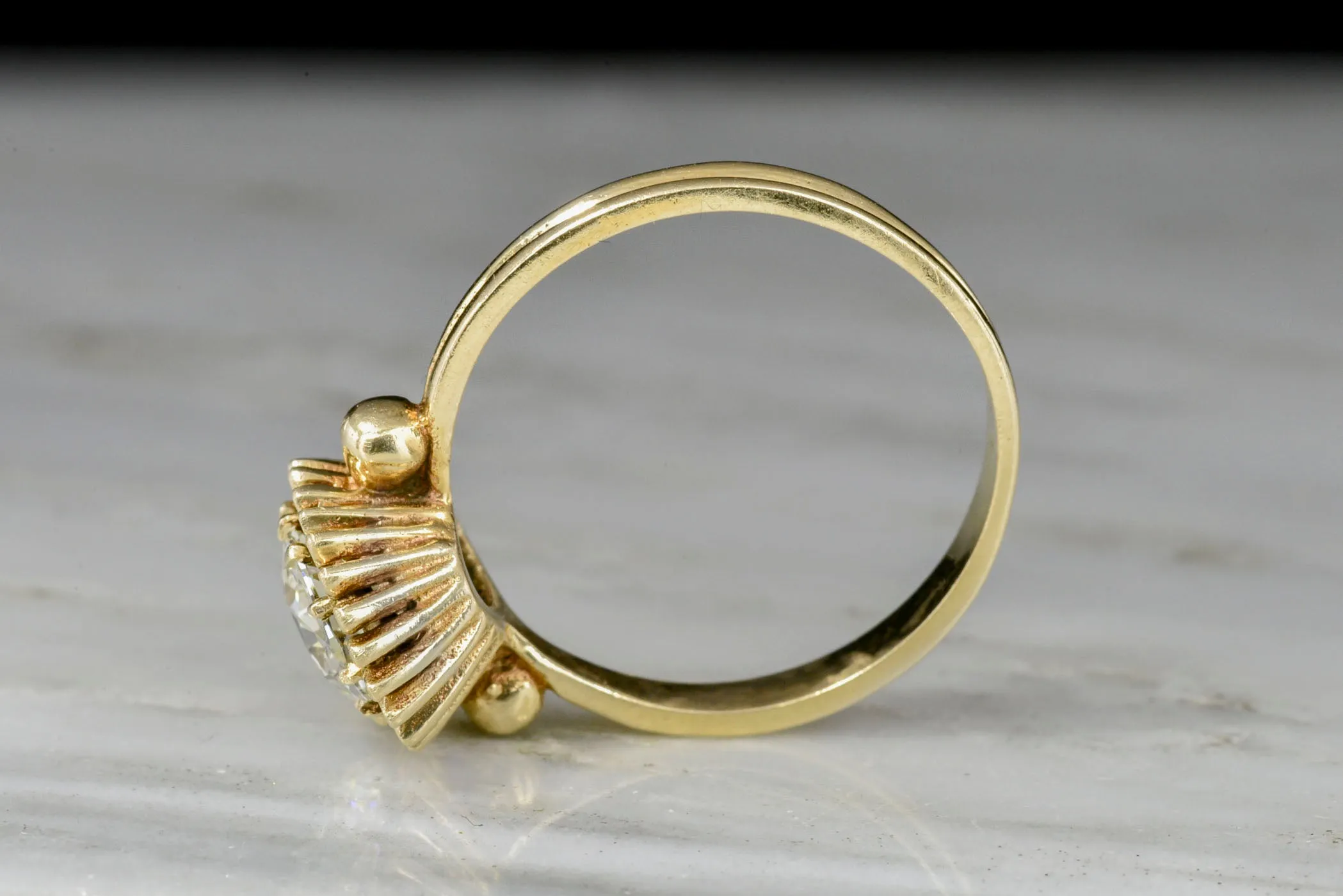 Unique Art Deco or Mid Century Gold Sunburst Ring with an Old Mine Cut Diamond Center