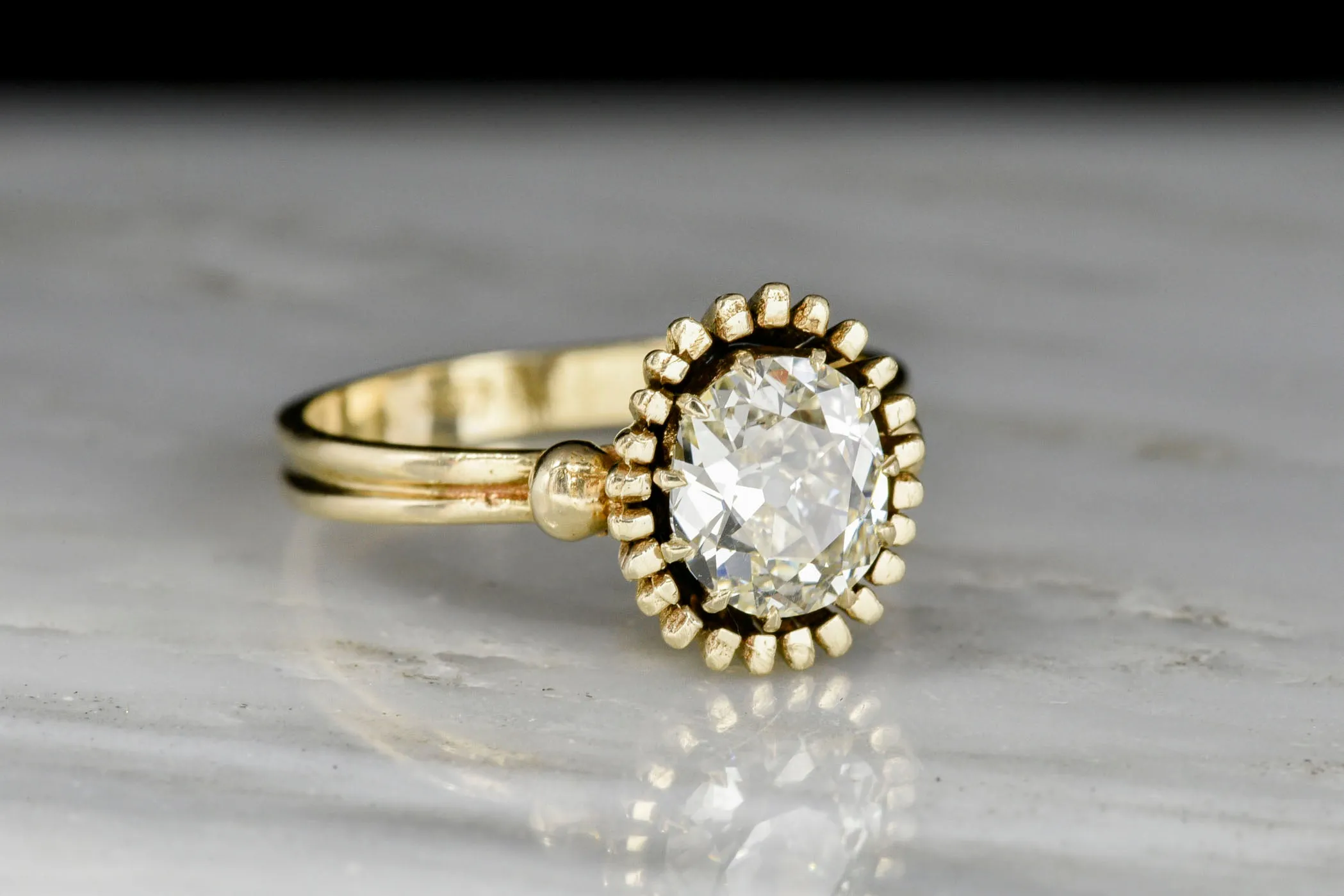 Unique Art Deco or Mid Century Gold Sunburst Ring with an Old Mine Cut Diamond Center